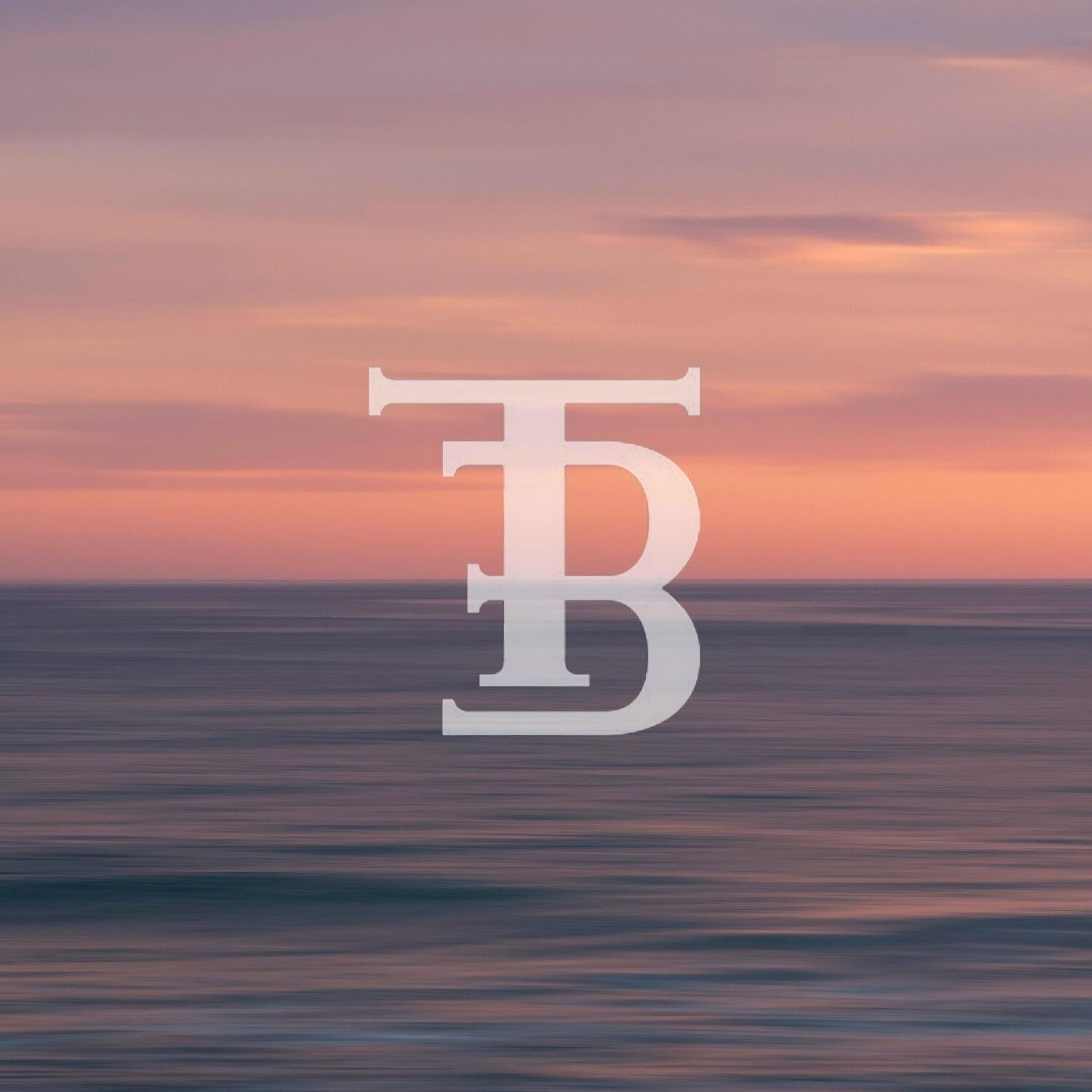 T.B.