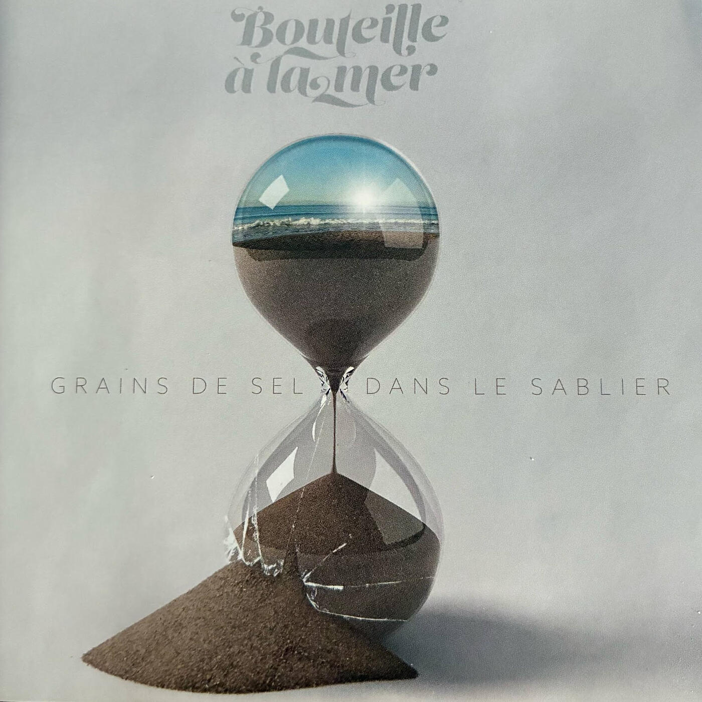 Релиз Grains de sel dans le sablier
