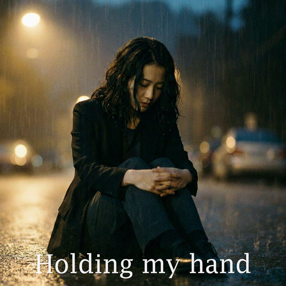 Релиз Holding My Hand