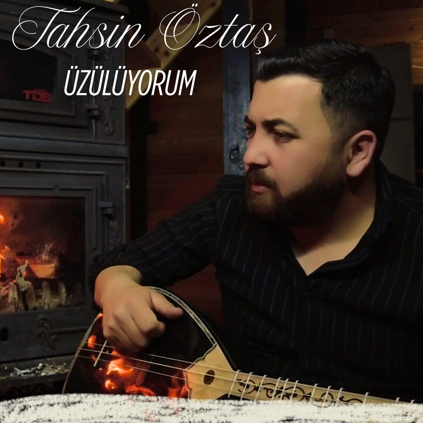 Трек Üzülüyorum