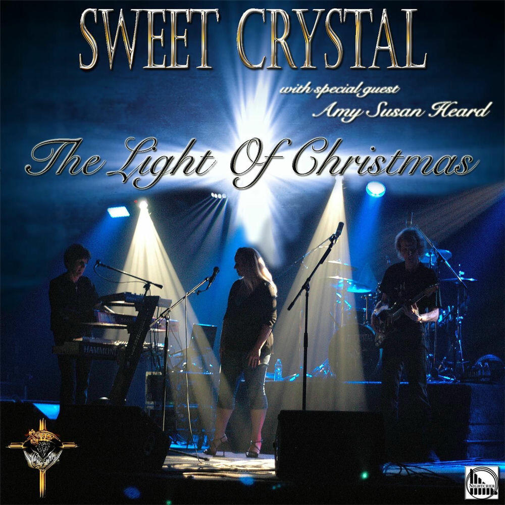 Релиз The Light of Christmas (feat. Amy Susan Heard)
