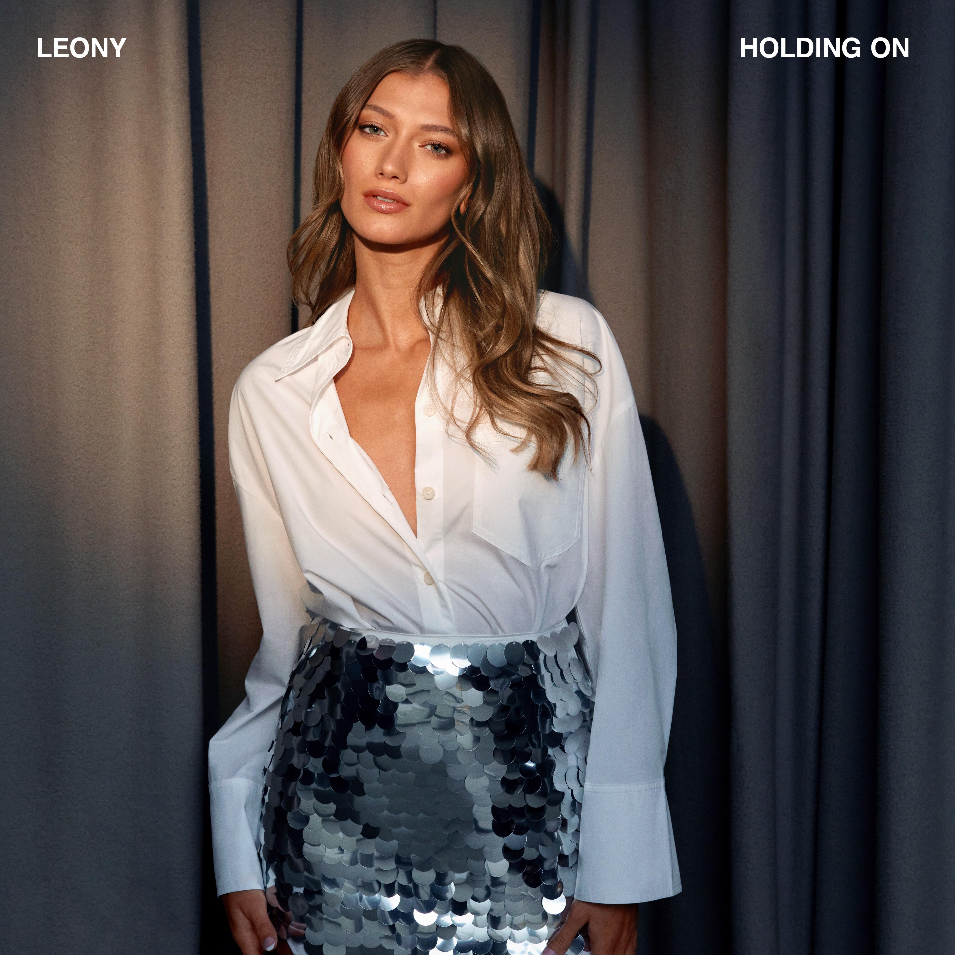 Релиз Holding On