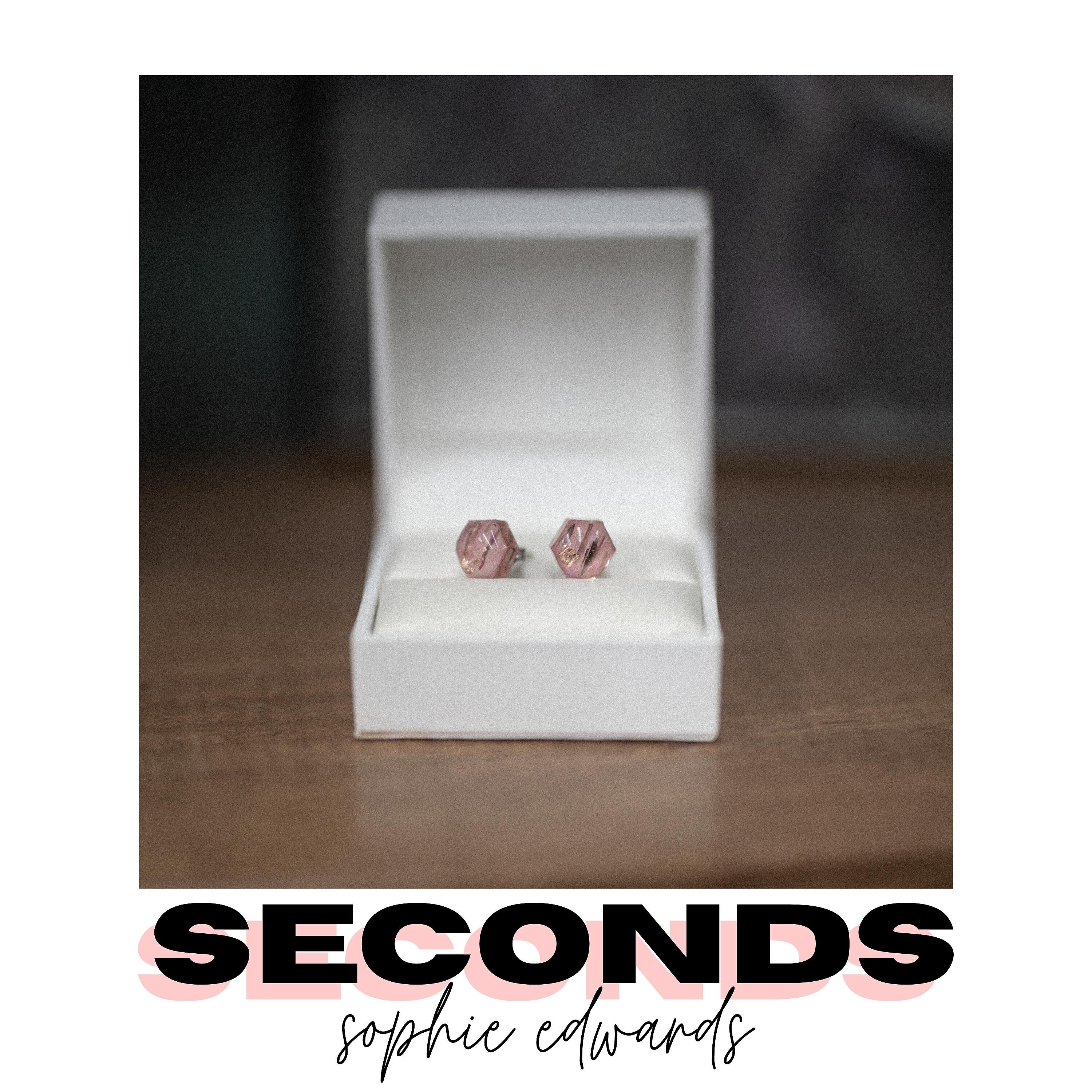 Постер альбома Seconds