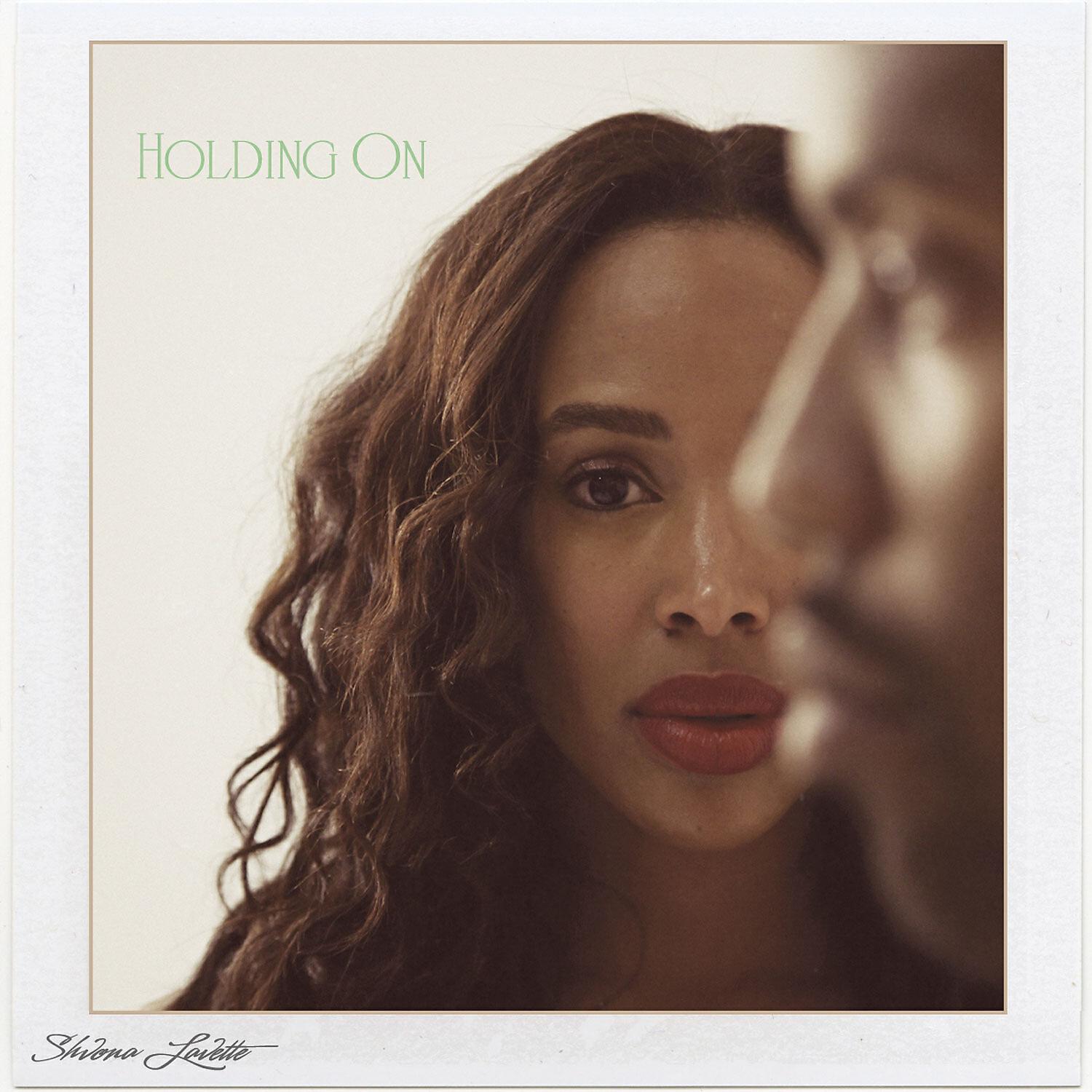 Релиз Holding On - Single