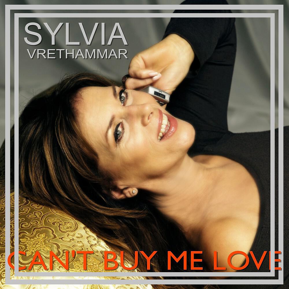 Релиз Can't Buy Me Love