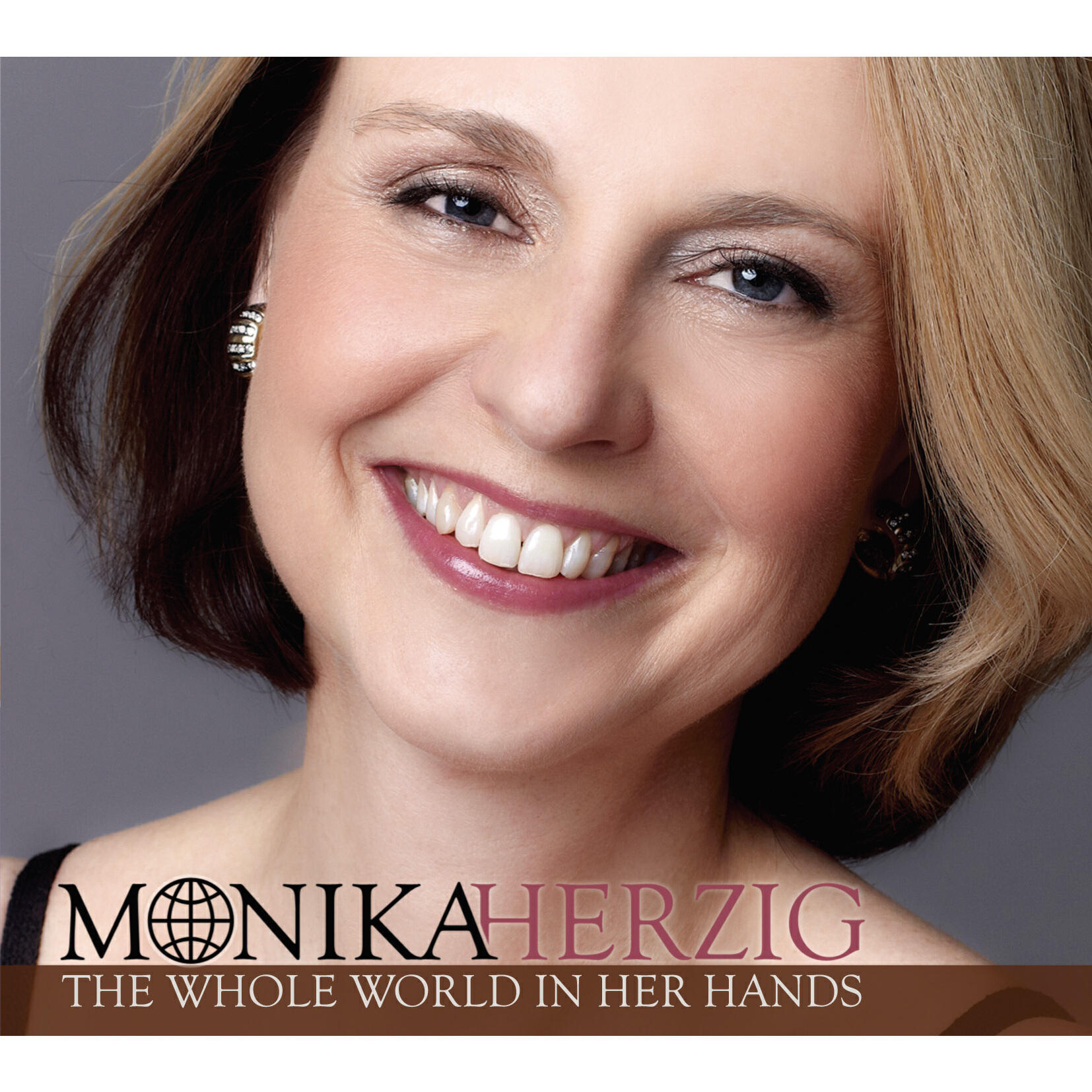 Релиз The Whole World in Her Hands